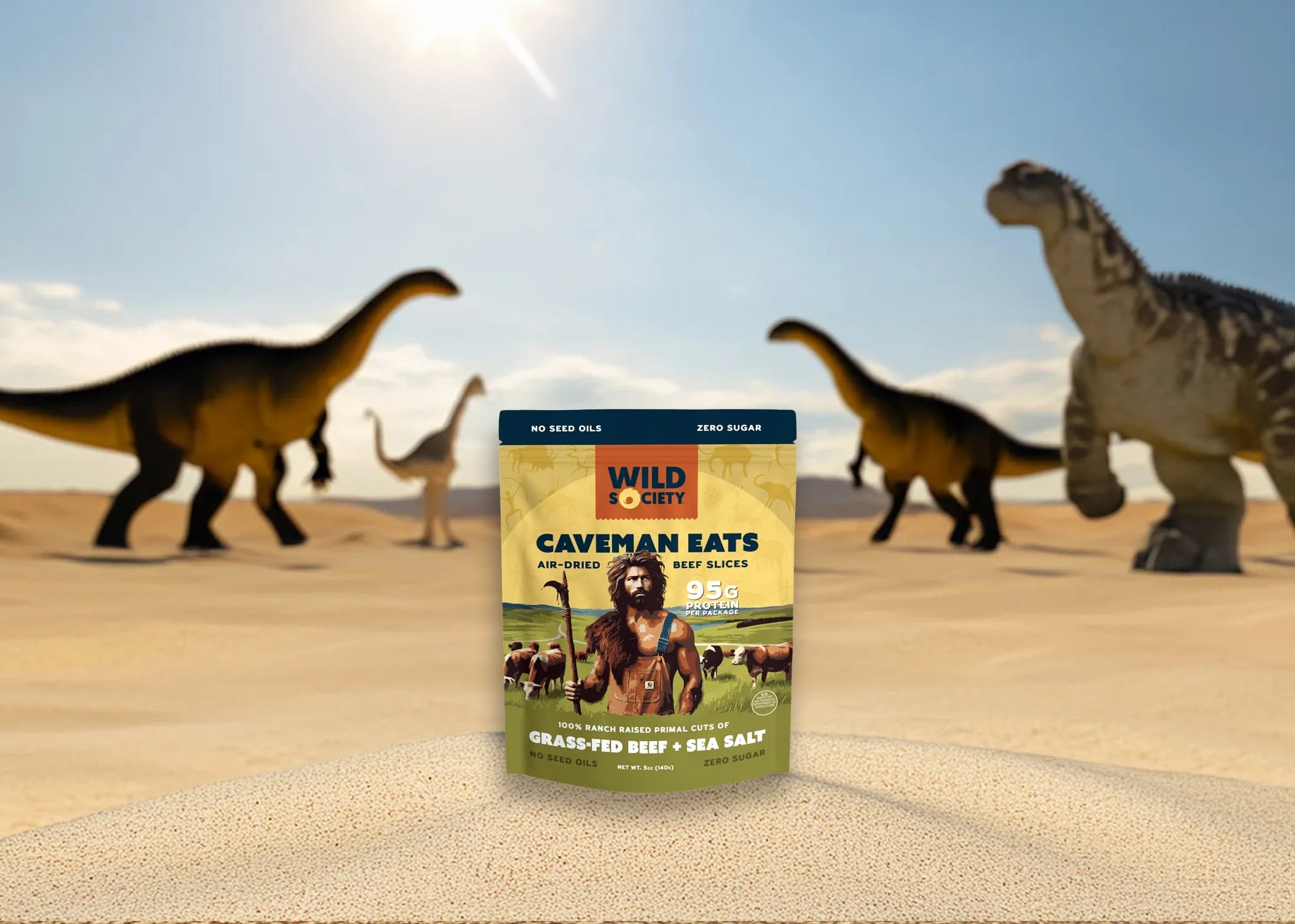 Caveman Eats food package with dinosaurs in the background