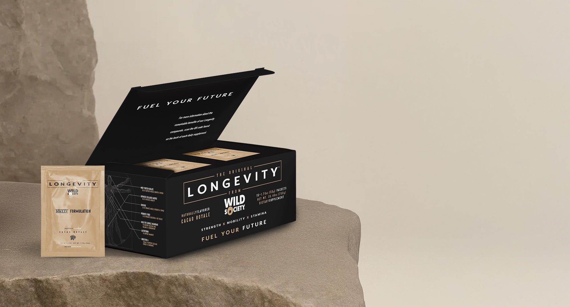 Box of Longevity powder with a single packet on a stone surface.
