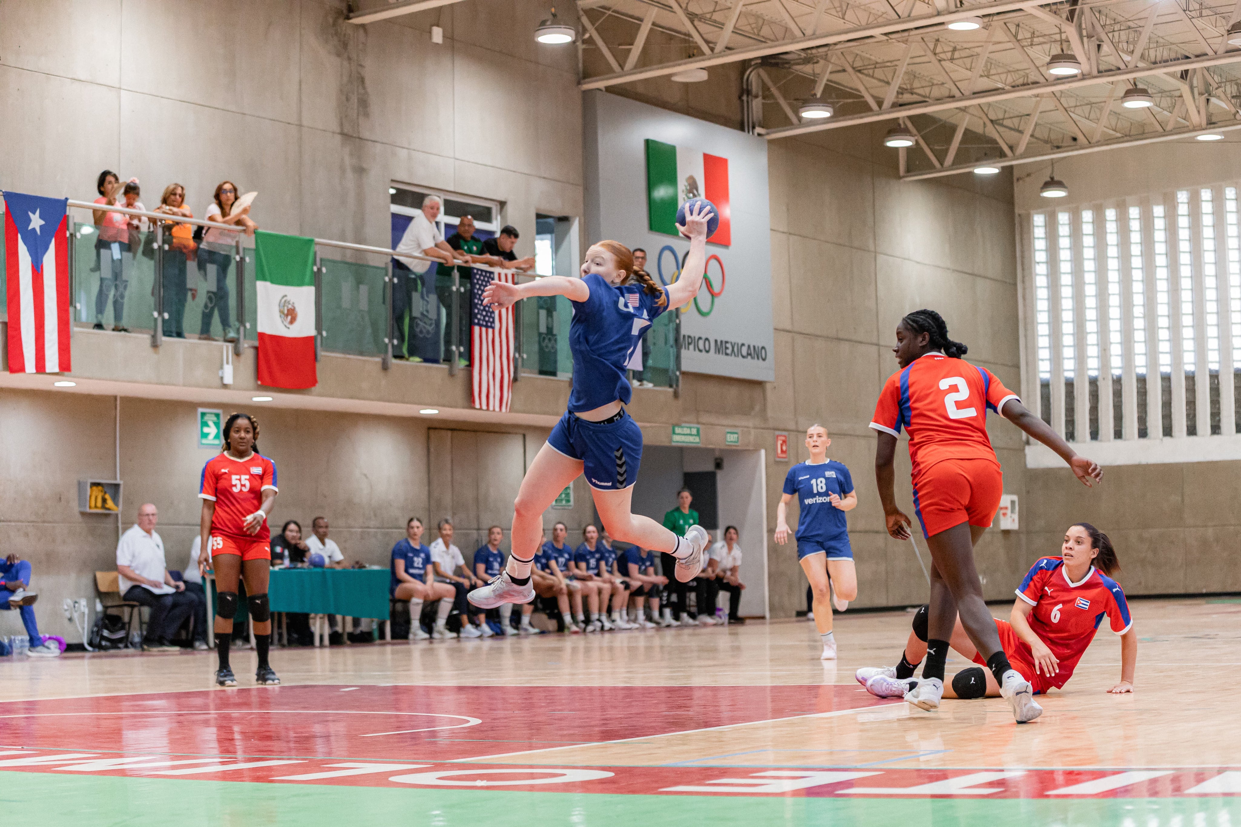 Ariane Clerc of Team USA Handball takes a shot at goal 