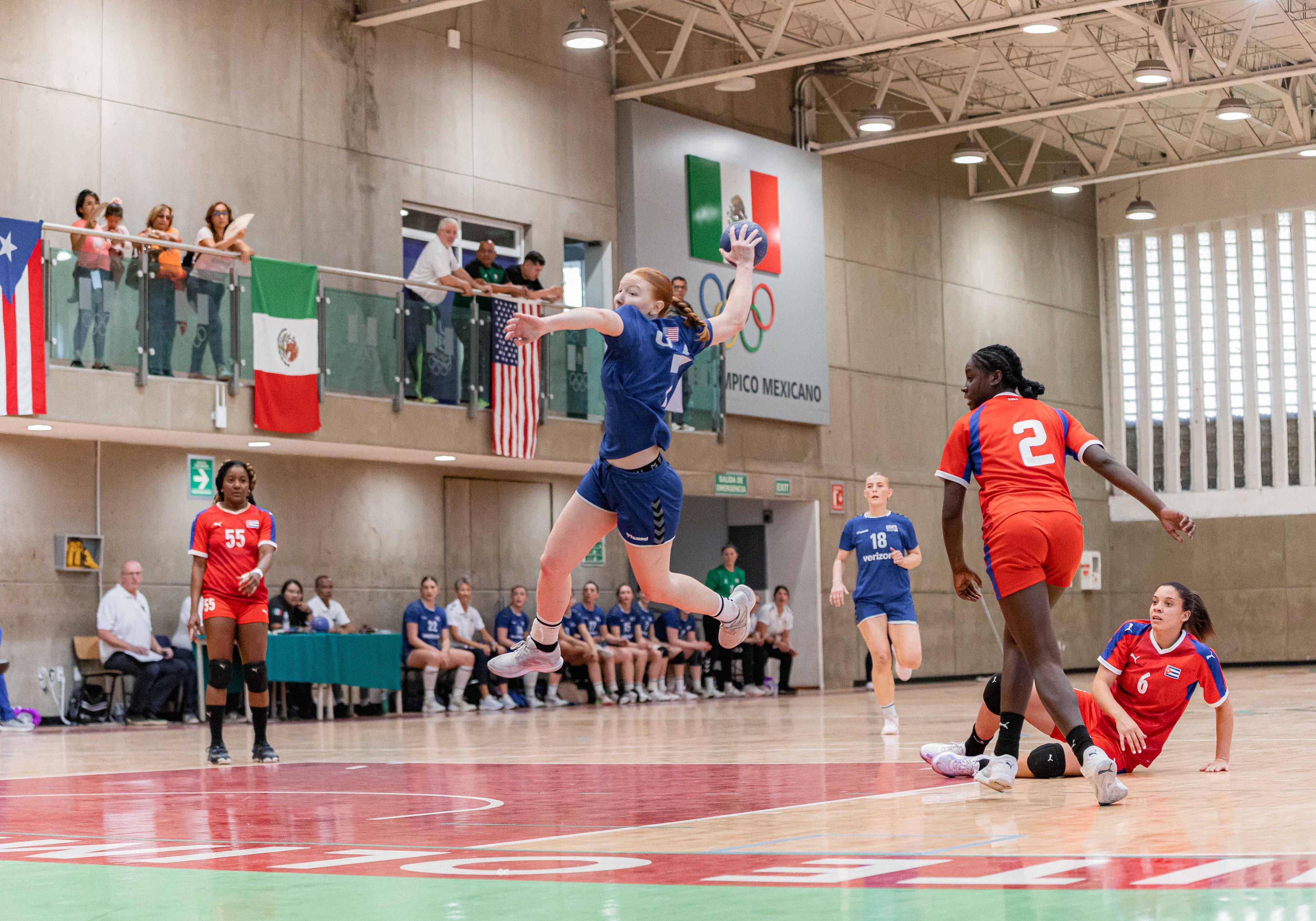 Ariane Clerc of Team USA Handball takes a shot at goal 