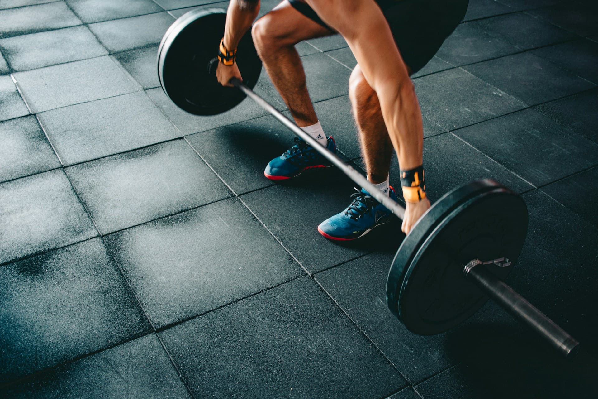 Forearm Muscle Strain - Man gets back to lifting a barbell with recovered forearms 