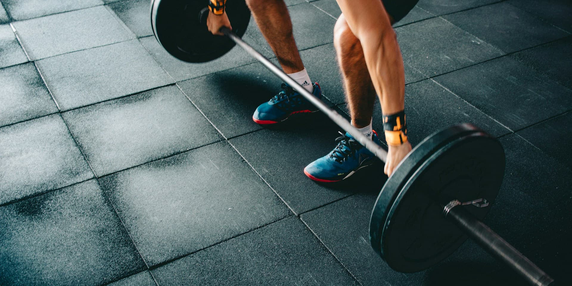 Forearm Muscle Strain - Man gets back to lifting a barbell with recovered forearms 