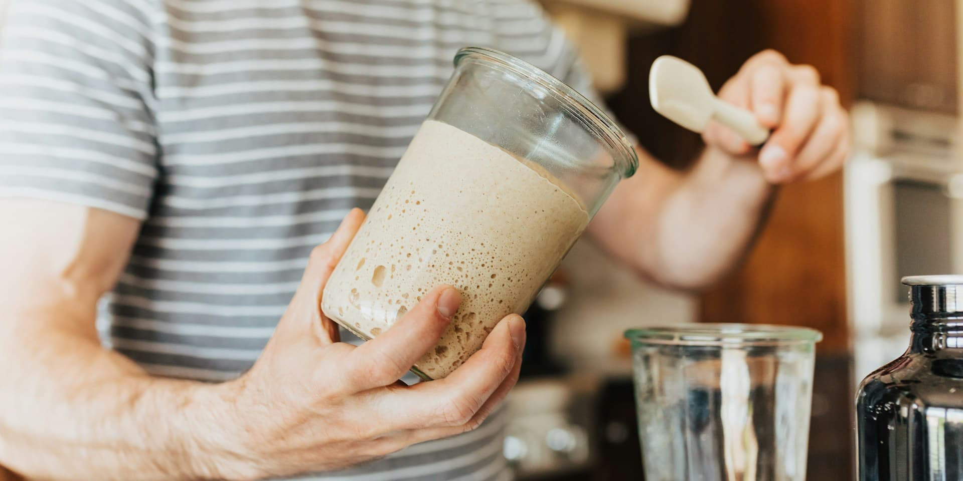 Man making a smoothie to find out what is the best protein powder for weight loss 