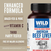 A bottle of Wild Society American Beef Liver dietary supplement shown next to marketing text on a beige background. The bottle is dark amber brown with a black cap and a white label featuring blue and red text.