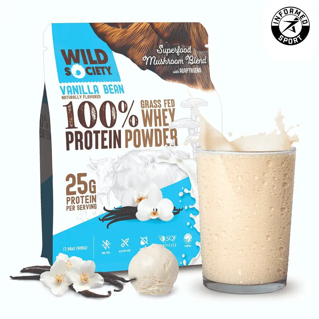 Wild Society vanilla bean protein powder package with a glass of protein shake and vanilla beans.